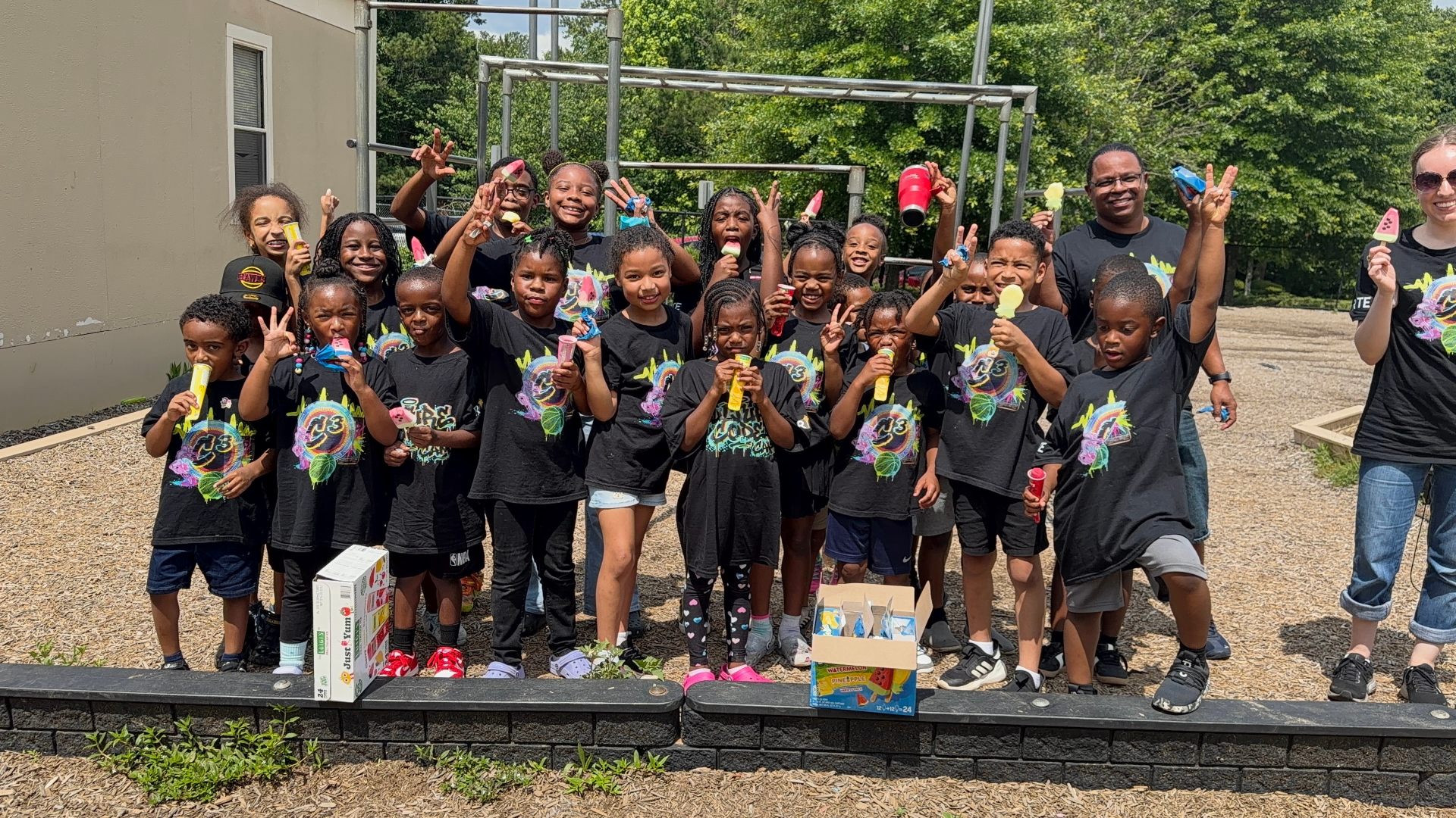 A Culture Code Camp student in a RITE tee follows an "Every Beat = One Tally" rhythm lesson